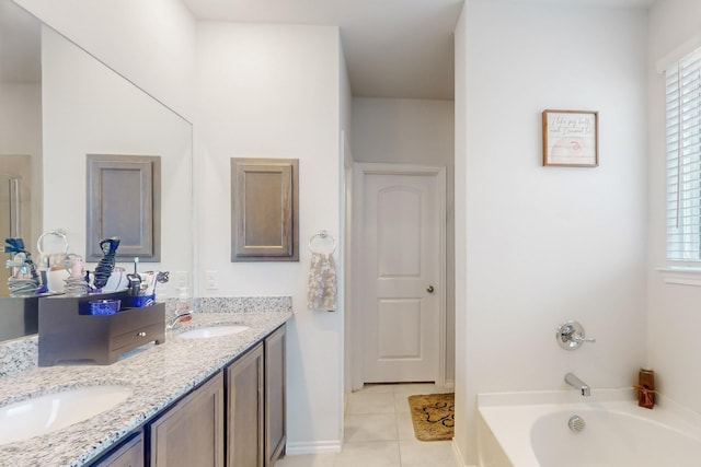2821 Journey Ln, Forney, TX 75126 - full bathroom with tile patterned flooring, double vanity, a bath, and baseboards