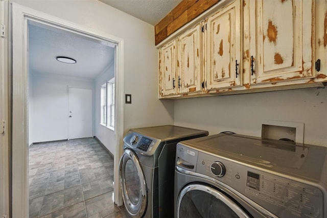 2306 Lavon Creek Ln, Arlington, TX 76006 - laundry room featuring cabinet space and washer and clothes dryer