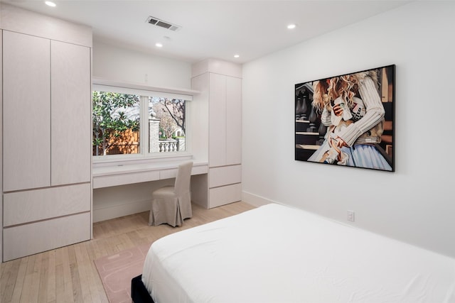 4416 Livingston Ave, Highland Park, TX 75205 - bedroom with visible vents, wood finished floors, and recessed lighting