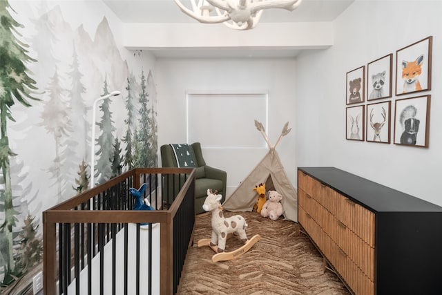 4416 Livingston Ave, Highland Park, TX 75205 - bedroom with a chandelier and a nursery area