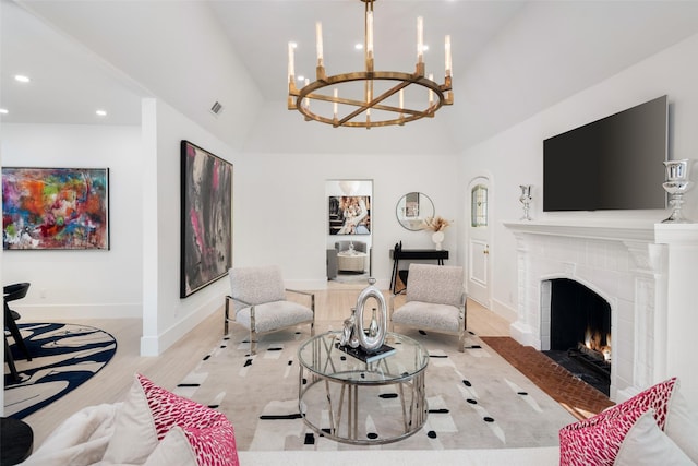 4416 Livingston Ave, Highland Park, TX 75205 - living area with a notable chandelier, a tile fireplace, recessed lighting, and wood finished floors