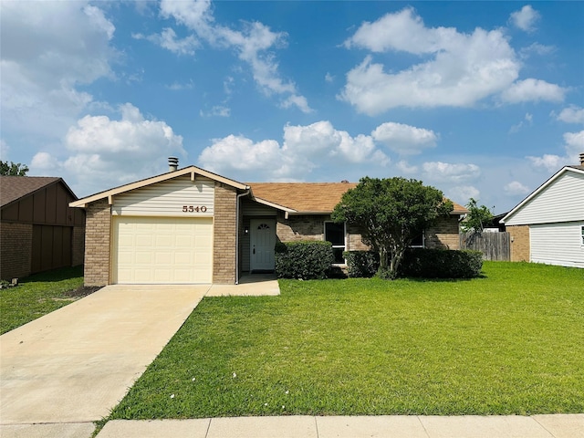 5540 Rutledge Dr, The Colony, TX 75056 - single story home with brick siding, fence, a garage, driveway, and a front lawn