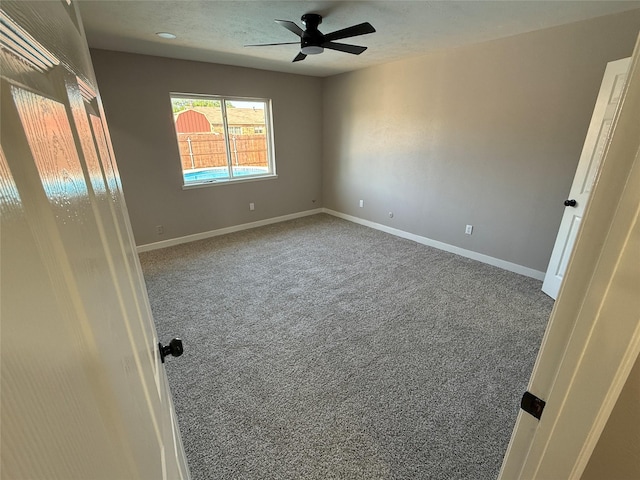 5540 Rutledge Dr, The Colony, TX 75056 - unfurnished bedroom featuring ceiling fan, baseboards, and carpet floors
