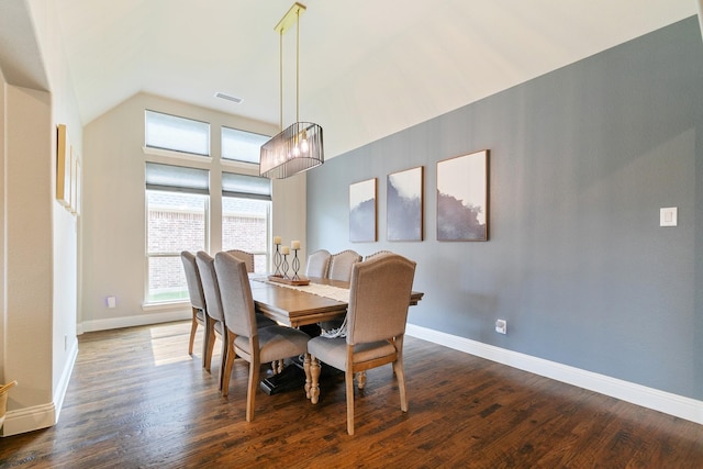 dining room featuring baseboards, visible vents, and dark wood-type flooring