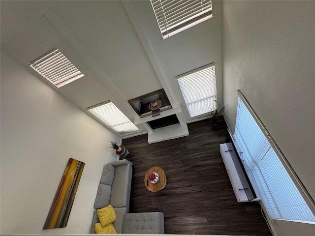 5516 Boca Raton Blvd Unit 312, Fort Worth, TX 76112 - living area with wood finished floors, a fireplace, and a towering ceiling