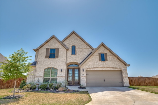 2702 Middleton Dr, Melissa, TX 75454 - french provincial home featuring brick siding, french doors, fence, and concrete driveway