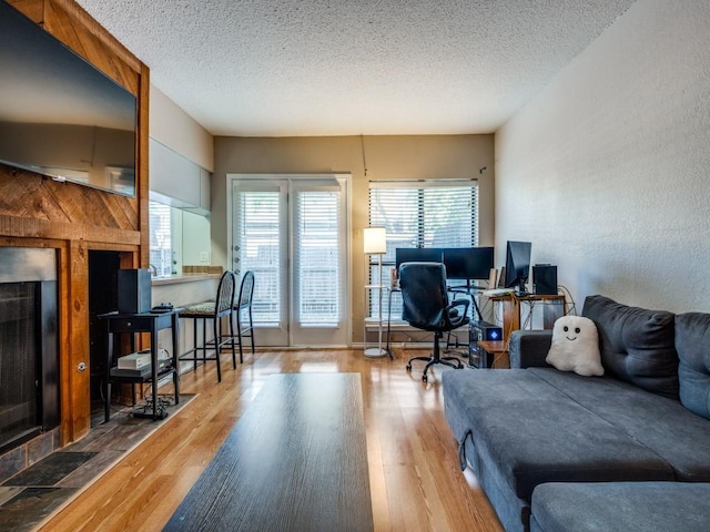 office space featuring a textured ceiling and wood finished floors