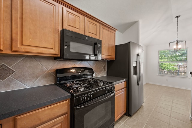 kitchen featuring baseboards, black appliances, backsplash, and dark countertops