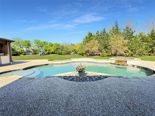 view of pool with a lawn, a patio, and a pool with connected hot tub