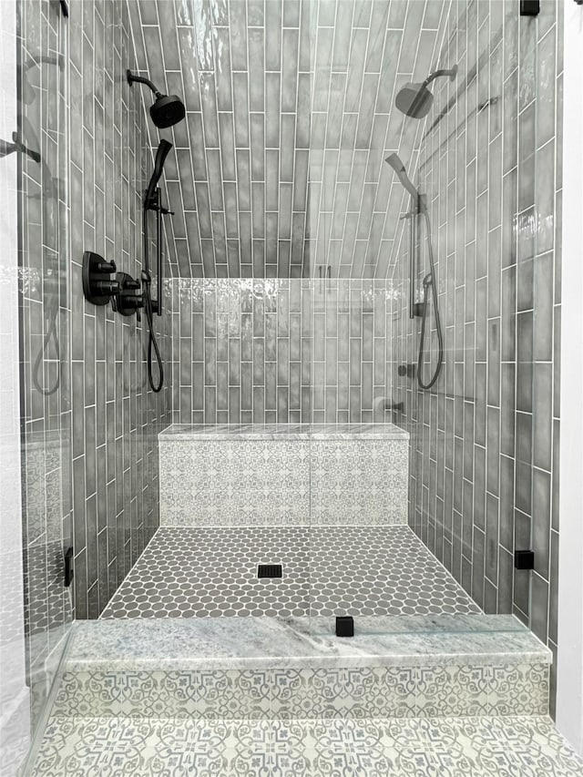 bathroom featuring a shower stall