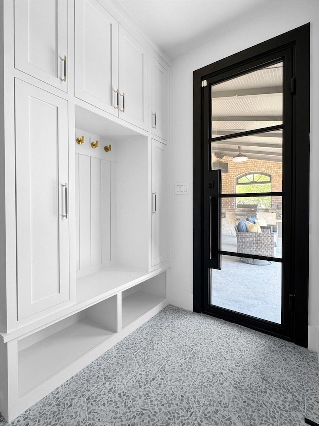 mudroom with tile patterned floors