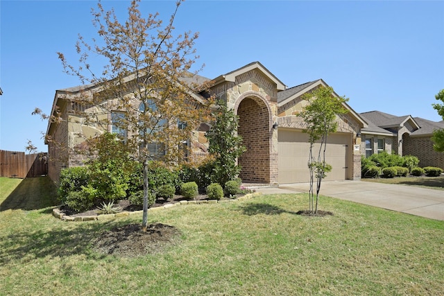 view of front of property with a front yard, stone siding, brick siding, a garage, and concrete driveway