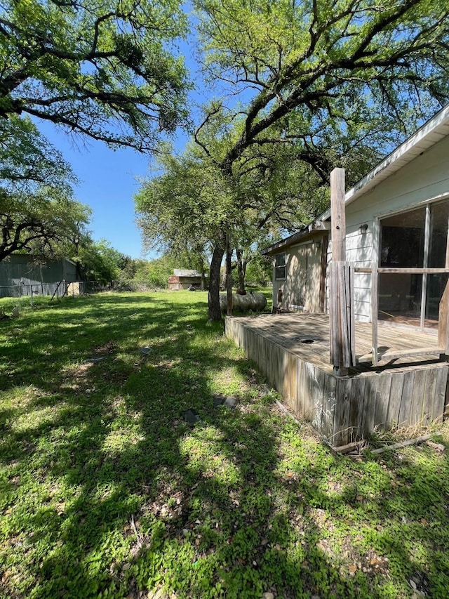 305 County Road 1607, Clifton, TX 76634 - view of grassy yard with a deck