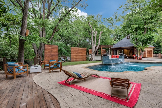 11484 Strait Ln, Dallas, TX 75229 - view of pool featuring an exterior structure, an outbuilding, a deck, and view of wooded area