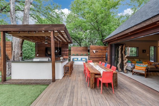 11484 Strait Ln, Dallas, TX 75229 - wooden terrace featuring an outdoor bar, area for grilling, an outdoor hangout area, and a ceiling fan