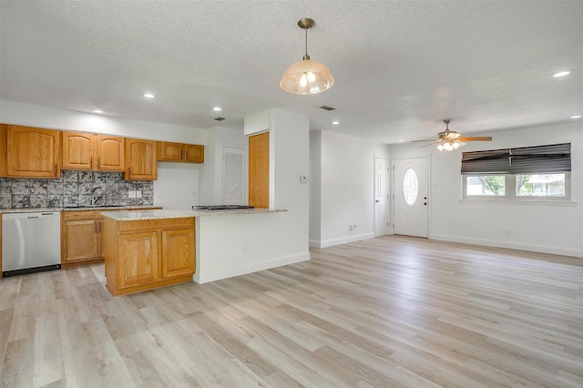 436 Nathan St, Burleson, TX 76028 - kitchen featuring dishwasher, open floor plan, a textured ceiling, decorative backsplash, and light wood-style floors