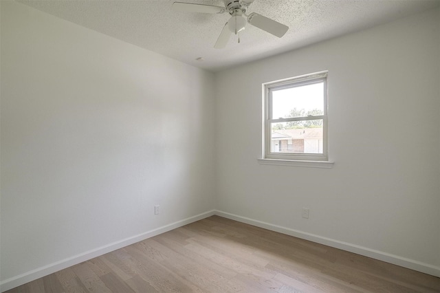 436 Nathan St, Burleson, TX 76028 - unfurnished room featuring light wood-style floors, a textured ceiling, baseboards, and ceiling fan
