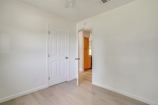 436 Nathan St, Burleson, TX 76028 - unfurnished bedroom with light wood finished floors, baseboards, and ceiling fan