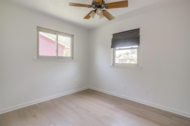 436 Nathan St, Burleson, TX 76028 - unfurnished room featuring light wood finished floors, a ceiling fan, and baseboards