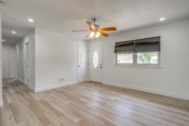 436 Nathan St, Burleson, TX 76028 - entrance foyer with light wood-type flooring, baseboards, ceiling fan, recessed lighting, and a textured ceiling