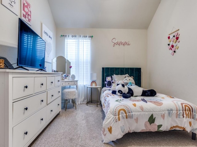 bedroom with light carpet