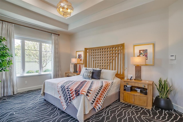 bedroom with carpet and baseboards