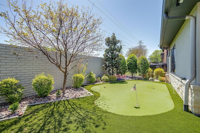 view of yard featuring a fenced backyard