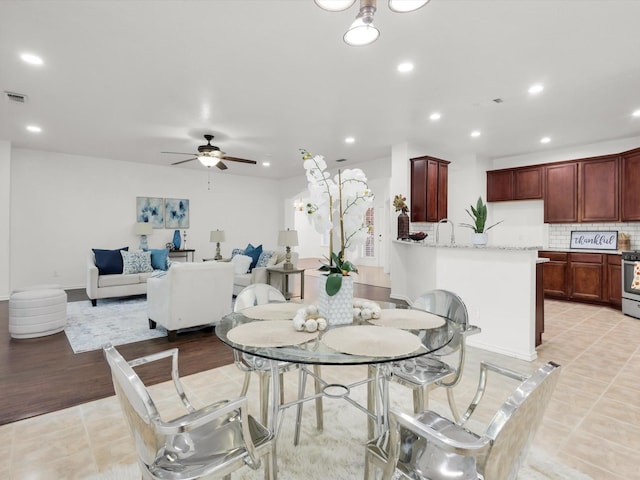 dining space featuring baseboards, recessed lighting, light tile patterned floors, visible vents, and ceiling fan