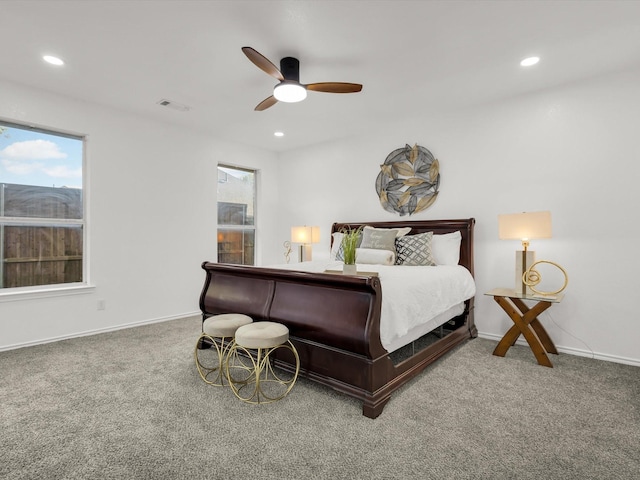 carpeted bedroom with visible vents, ceiling fan, and recessed lighting