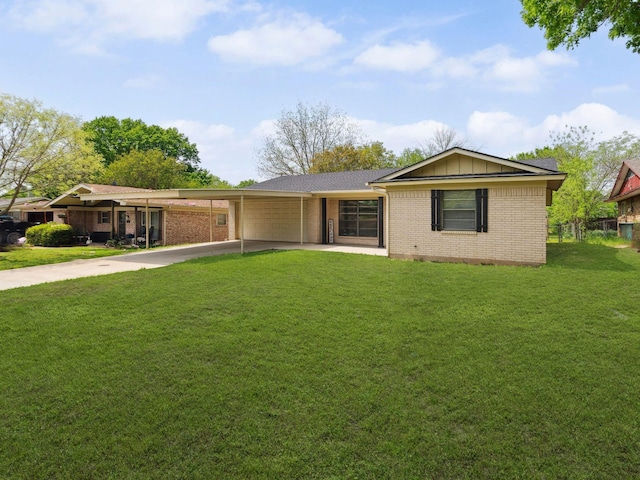 1120 S Valentine Dr, Sherman, TX 75090 - single story home with a garage, concrete driveway, brick siding, a carport, and a front yard