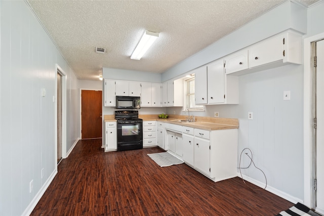 1120 S Valentine Dr, Sherman, TX 75090 - kitchen with black appliances, a sink, light countertops, a textured ceiling, and dark wood finished floors