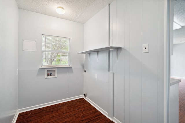 1120 S Valentine Dr, Sherman, TX 75090 - laundry room with washer hookup, a textured ceiling, wood finished floors, hookup for an electric dryer, and baseboards