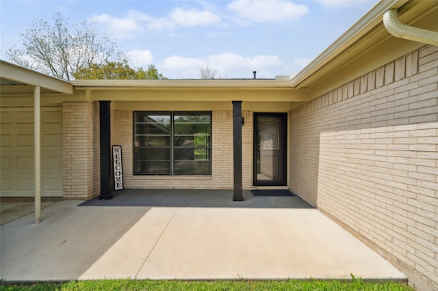 1120 S Valentine Dr, Sherman, TX 75090 - entrance to property featuring brick siding and an attached garage