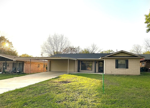 1120 S Valentine Dr, Sherman, TX 75090 - ranch-style home featuring a garage, brick siding, driveway, and a front yard
