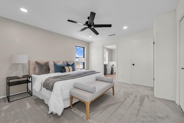 bedroom featuring visible vents, baseboards, ceiling fan, recessed lighting, and light colored carpet