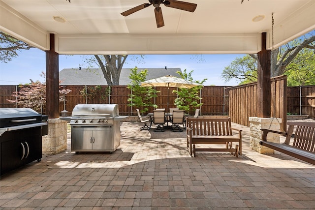 803 Surrey Ln, Grapevine, TX 76051 - view of patio / terrace featuring ceiling fan, outdoor dining area, a fenced backyard, and a grill