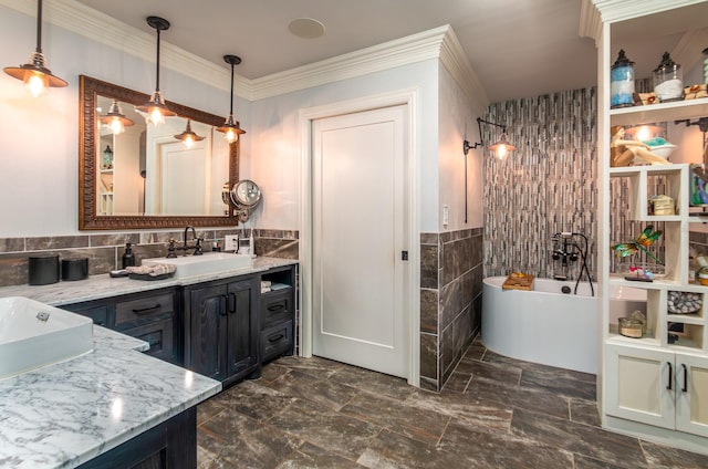 full bath featuring crown molding, a soaking tub, vanity, and tile walls