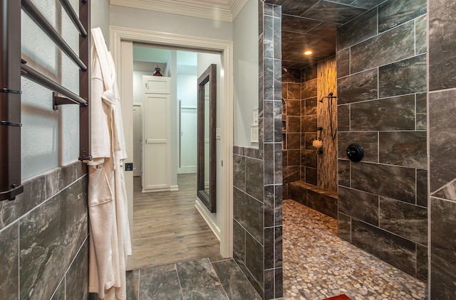 full bath with ornamental molding and a walk in shower