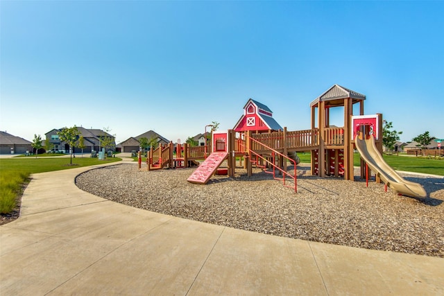 communal playground with a lawn
