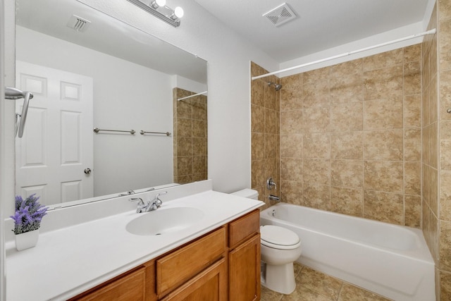 full bathroom with shower / bath combination, vanity, visible vents, and toilet