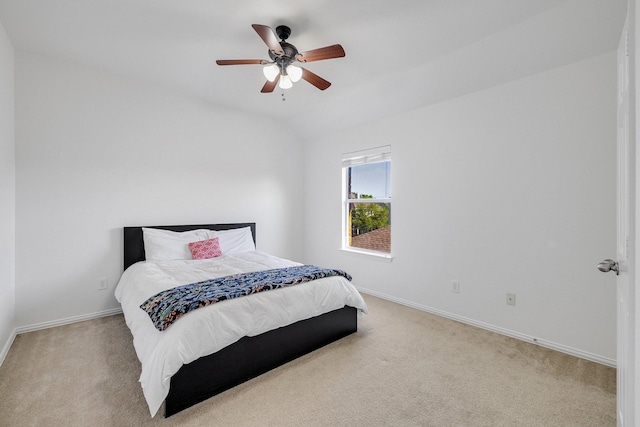 carpeted bedroom featuring ceiling fan and baseboards