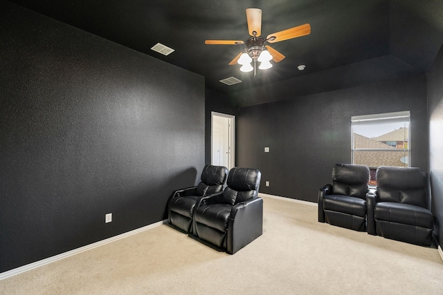 cinema with visible vents, ceiling fan, carpet flooring, and baseboards