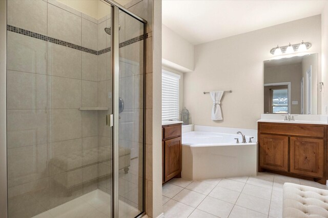 191 Cardiff Ln, Waxahachie, TX 75167 - full bathroom with a stall shower, tile patterned flooring, a garden tub, and vanity