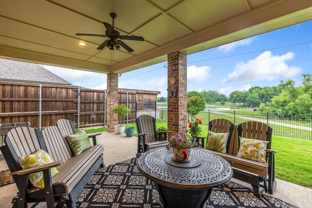 view of patio / terrace featuring a ceiling fan and outdoor dining area
