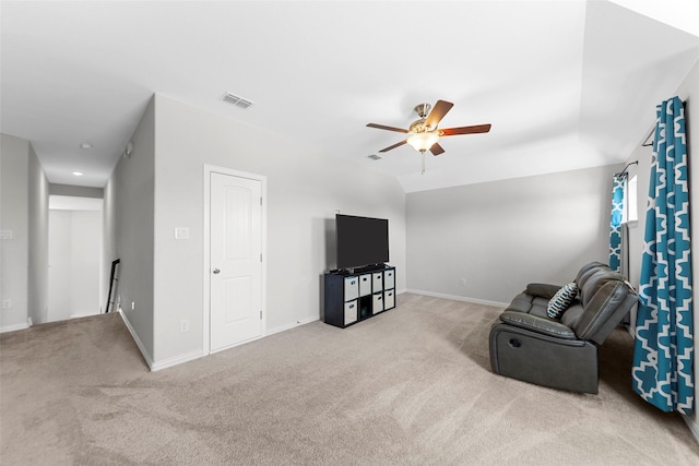 unfurnished living room with carpet, visible vents, baseboards, and ceiling fan