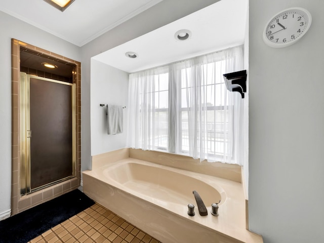 1770 Plummer Dr, Rockwall, TX 75087 - full bathroom with a stall shower, a garden tub, healthy amount of natural light, tile patterned flooring, and crown molding