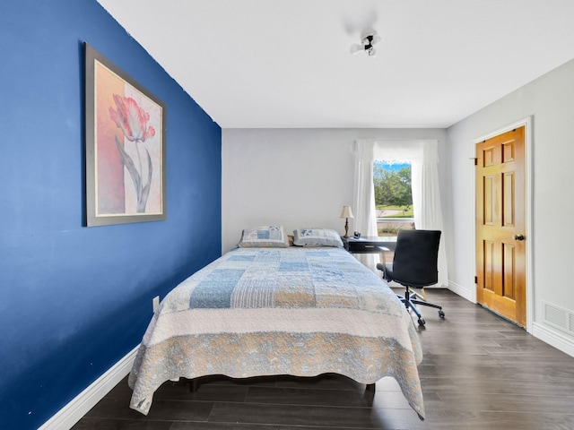 1770 Plummer Dr, Rockwall, TX 75087 - bedroom featuring wood finished floors and baseboards