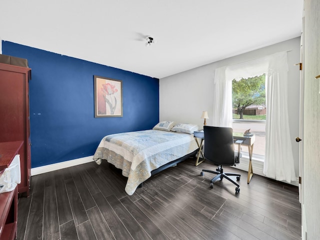 1770 Plummer Dr, Rockwall, TX 75087 - bedroom featuring wood finished floors, a desk, and baseboards