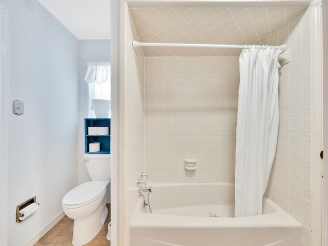 1770 Plummer Dr, Rockwall, TX 75087 - full bath featuring toilet, shower / bath combo with shower curtain, tile patterned floors, and baseboards