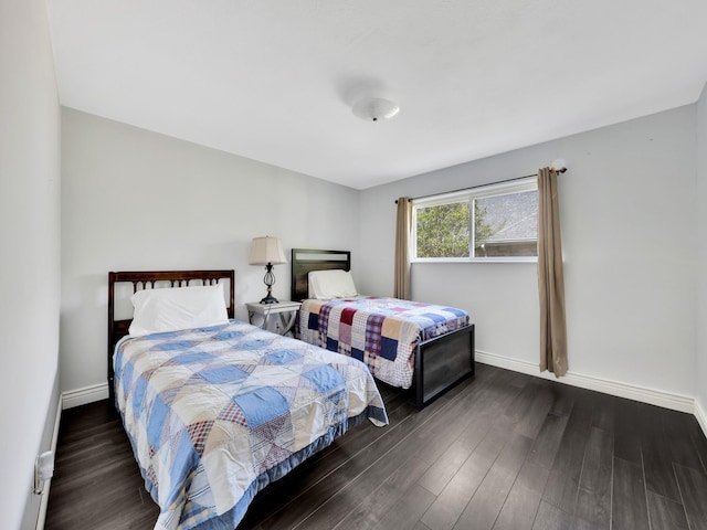 1770 Plummer Dr, Rockwall, TX 75087 - bedroom featuring wood finished floors and baseboards